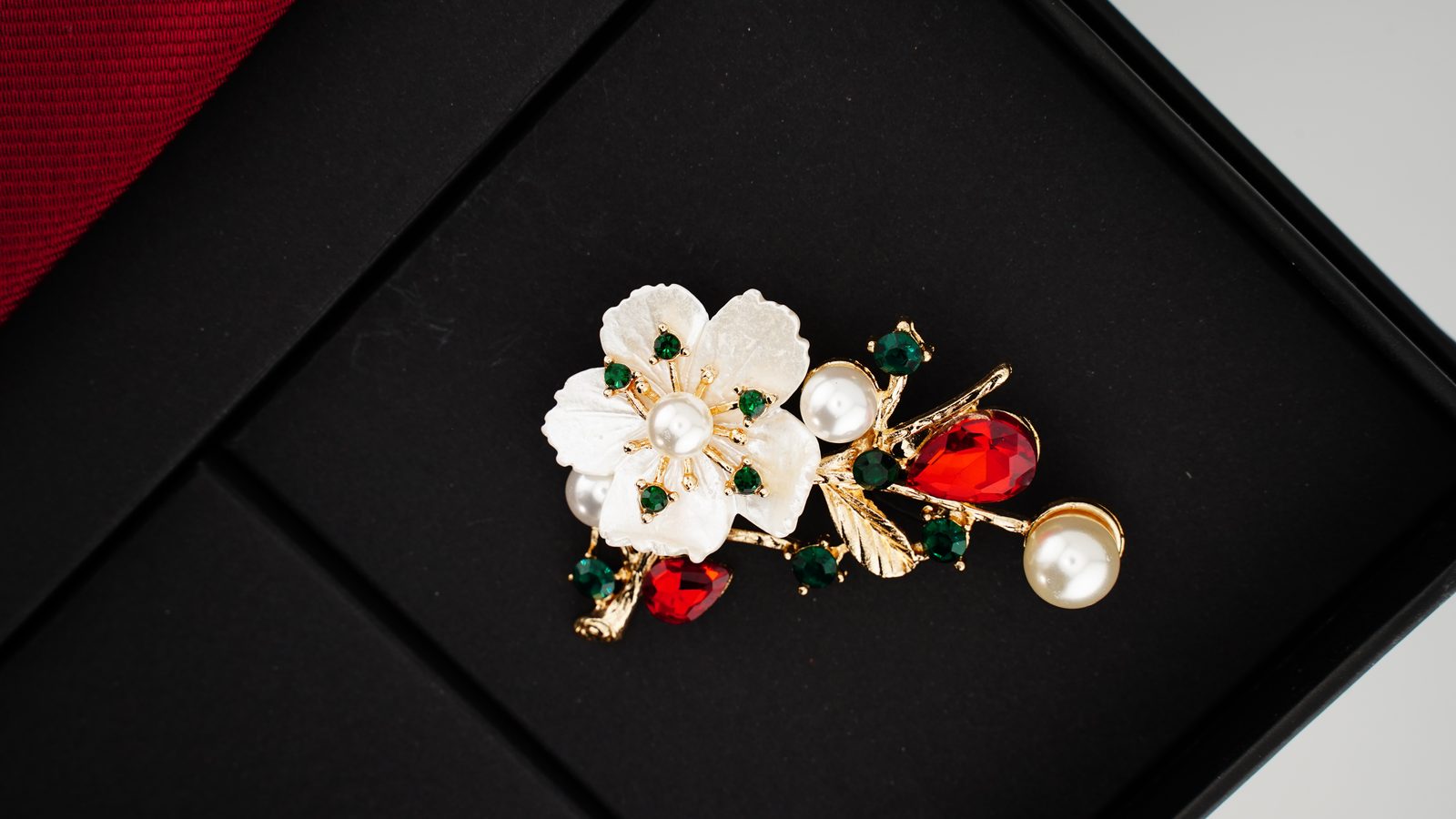 Sam & Sara Prestige Silk Collection — pearl and crystal blossom brooch on tie